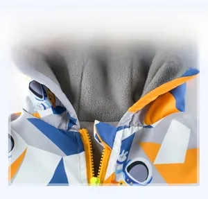 Detail of warm grey polar fleece lining and smooth zipper on astronaut print kids jacket