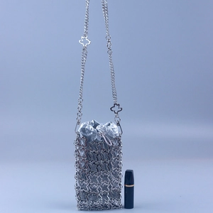 Mini hollow butterfly silver chain bag with metallic drawstring pouch and slim strap