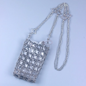 Silver hollow flower metal mesh mobile phone bag with chain strap and satin drawstring pouch