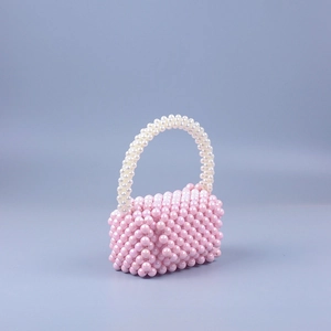 Handmade light pink acrylic pearl beaded handbag with circular handle for women