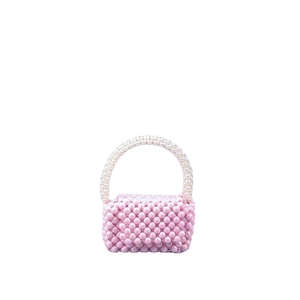 Mini pink pearlescent beaded handbag with white pearl handle for women and girls