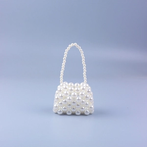 Handmade mini pearl beaded handbag with elegant glossy finish for evening wear