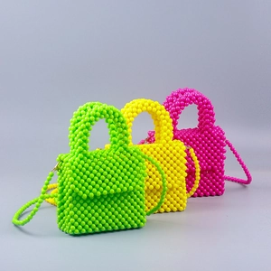 Mini acrylic beaded crossbody bags in vibrant green, yellow, and pink colors