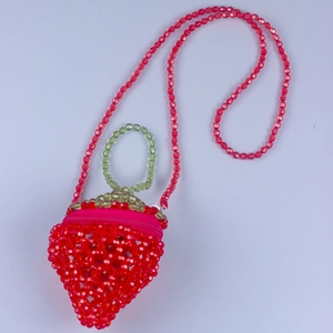 Handmade strawberry-shaped acrylic beaded crossbody bag with a red pearl strap