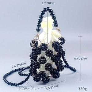 Detailed dimensions of black beaded bucket bag with white satin drawstring pouch