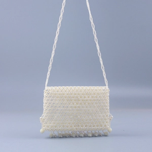 Sac bandoulière fait main en perles avec glands en acrylique et design de style ethnique