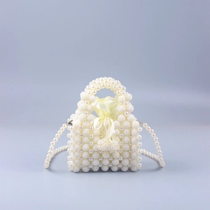 Mini pearl beaded handbag with drawstring satin lining and crossbody strap for women