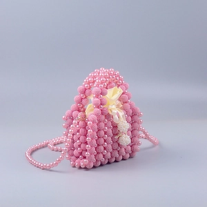 Pink pearl beaded handbag with satin drawstring pouch and detachable shoulder strap