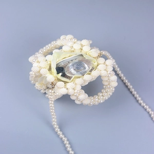 Mini handmade pearl beaded handbag for women with internal satin pouch and strap