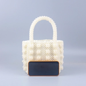 Elegant white handmade faux pearl beaded mini tote bag with stylish top handle