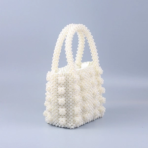 Elegant pearl beaded handbag with 3D floral accents for wedding and evening formal events
