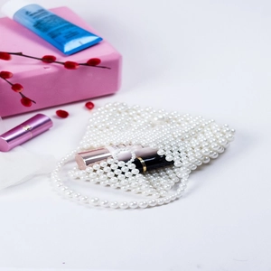 Mini pearl beaded handbag for women, handmade top-handle dumpling bag with glossy pearls