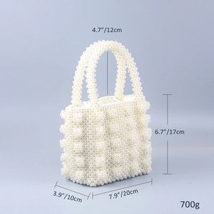 Detailed view of handmade faux pearl handbag dimensions 20x17x10cm with beaded handle