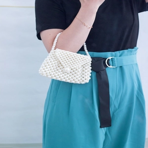 Handmade white faux pearl woven mini handbag with crossbody strap for elegant women