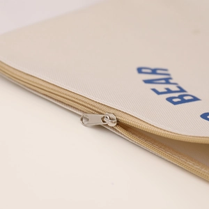 Close-up of canvas texture and durable zipper on the A4 animal document bag