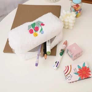 Plush white cosmetic bag with tulip embroidery and stationery storage capacity