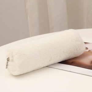Close-up of white plush pencil case showing soft faux fur texture and silver zipper