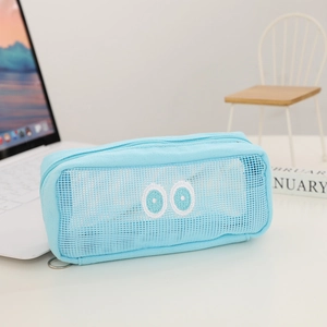 Macro shot of light blue mesh pencil case featuring white embroidered eyes and zipper