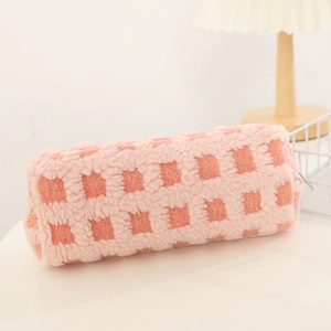 Detail of pink waffle fleece pencil case showing plush texture and metal zipper