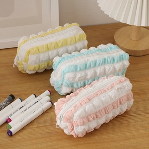 Minimalist puffer-style large capacity pencil case with colorful puff fabric stripes