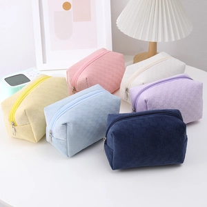 Detailed view of large capacity checkerboard pencil cases in six assorted pastel colors