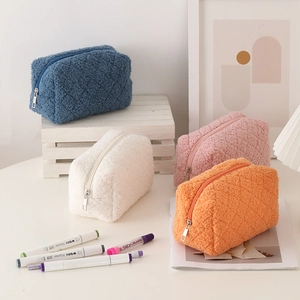 Quilted plush pencil case in various colors featuring a soft lamb wool texture and zipper