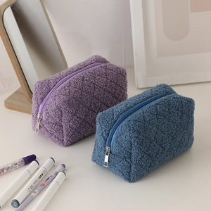 Quilted plush pencil case in blue and purple colors with durable metal zipper