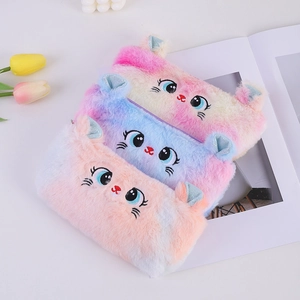 Three plush cat pencil cases in pastel gradients with embroidered facial features