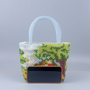 Handmade beaded handbag with colorful forest landscape pattern and round beaded handle