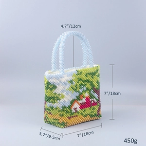 Detailed size and weight specs for a handmade beaded handbag with forest landscape pattern