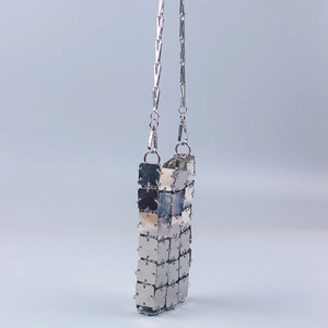 Silver metallic square panel crossbody phone bag with chain strap and industrial grid design