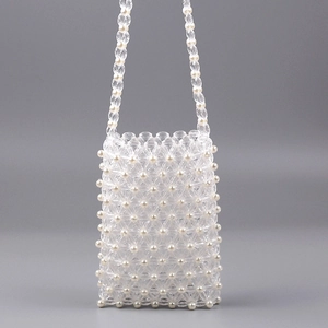 Handmade clear acrylic beaded mini crossbody bag with white pearls and long woven straps