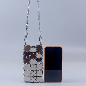 Handcrafted silver metallic sequin crossbody phone bag with chain strap and square tile detail