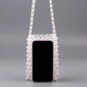 Handmade clear acrylic beaded phone bag with pearl accents and crossbody strap