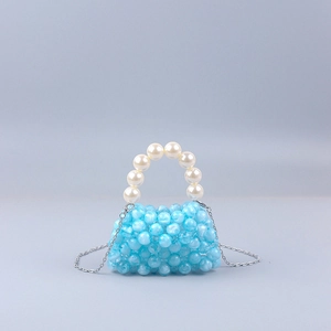 Mini hand-woven light blue marbled acrylic bead bag with elegant white pearl handle