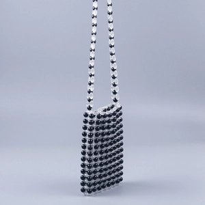 Handmade beaded crossbody bag with black and clear acrylic beads in a sleek square design