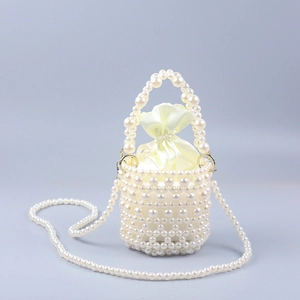 Handmade pearl woven bucket bag with drawstring satin lining and elegant pearl chain