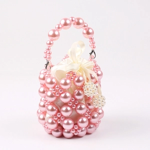 Handmade pink faux pearl beaded bucket bag with elegant cream satin drawstring pouch