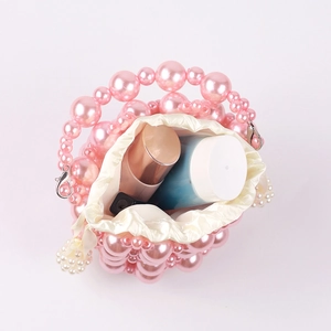 Pink handmade beaded bucket bag with imitation pearls and satin drawstring pouch