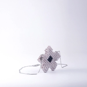 Handmade beaded silver star mini bag with purple and black beads and chain strap