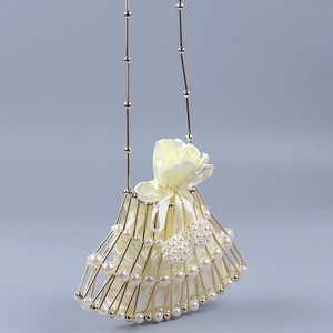 Handmade fan-shaped pearl bag with golden hollow frame and cream satin drawstring pouch