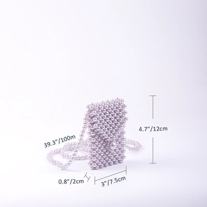 Detail view of mini handmade beaded crossbody bag with dimensions 12cm by 7.5cm