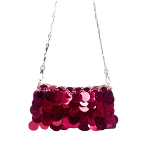 Sparkling red sequin evening clutch bag with elegant silver chain shoulder strap