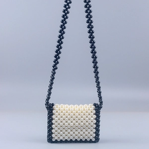 Handmade mini pearl crossbody bag with black and white woven beads for women