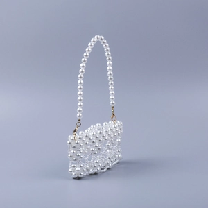 Elegant handmade white faux pearl woven mini handbag with detachable gold lobster clasps