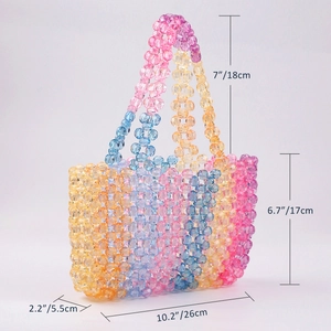 Detail showing dimensions of the rainbow beaded handbag with clear gradient round beads