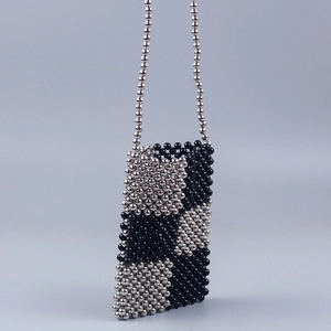 Handmade silver and black checkered beaded crossbody phone bag with long chain strap