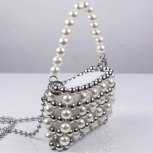 Handmade pearl and silver bead evening clutch bag with top handle and metal chain strap