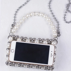 Handmade pearl and silver bead mini crossbody bag with a chain strap and top handle