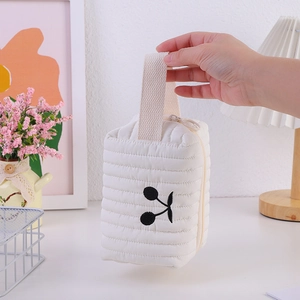 Quilted white cherry embroidery makeup bag with soft texture and sturdy handle